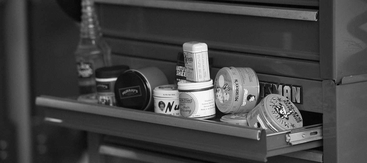 100 Years of Murray's Pomade Superior Products background